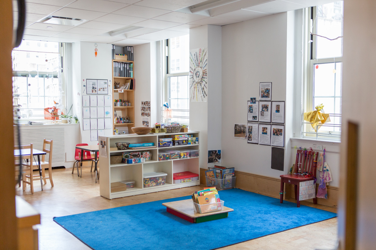 classroom with blue rug